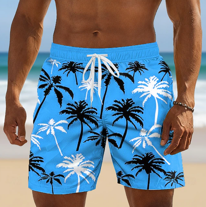 Lightweight men's summer shorts. Drawstring waist & tropical design, great for casual vacation fashion.