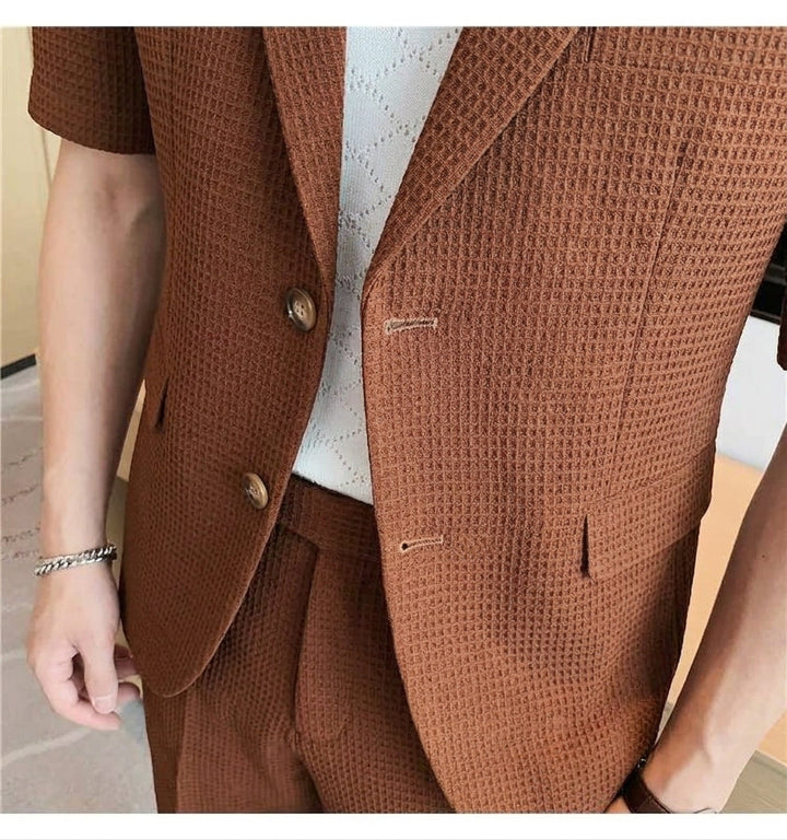 Stylish men's casual two-piece set: short sleeve blazer & comfortable shorts. Perfect for warm weather fashion.
