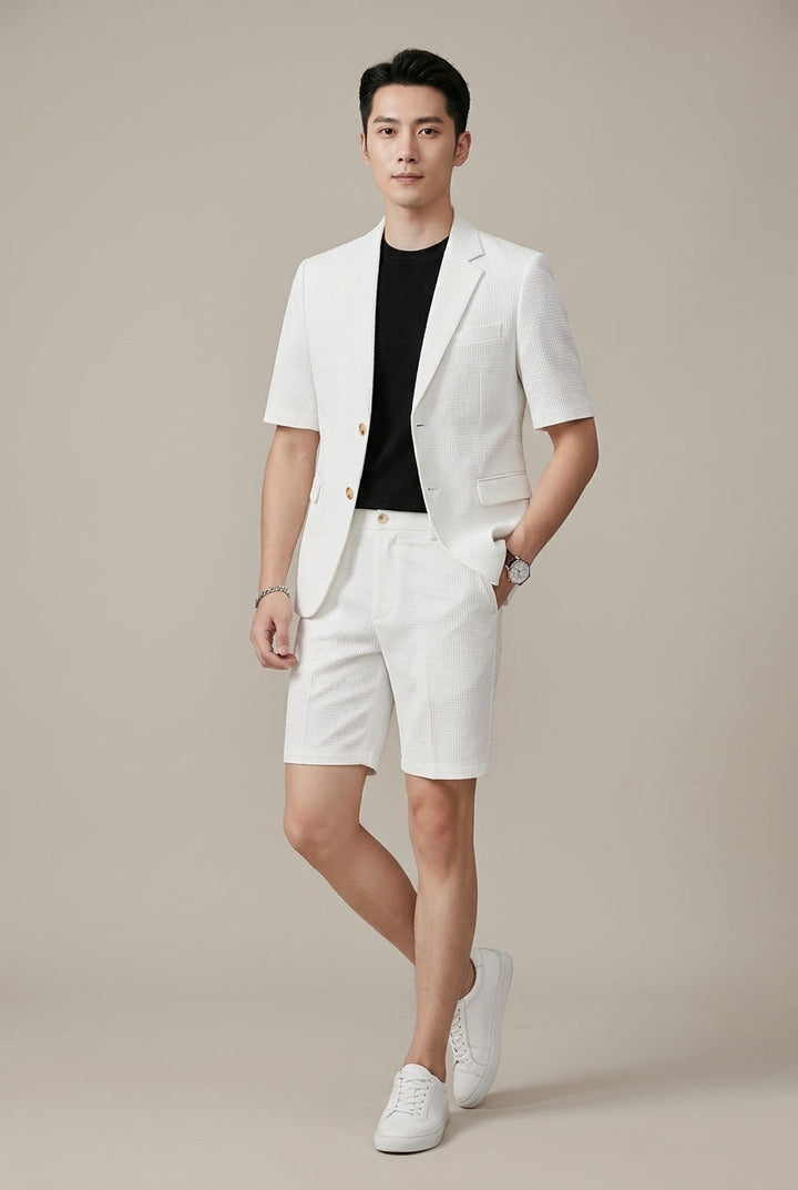 Men's summer holiday two-piece set, featuring a short-sleeve blazer and shorts. Relaxed yet chic travel wear.