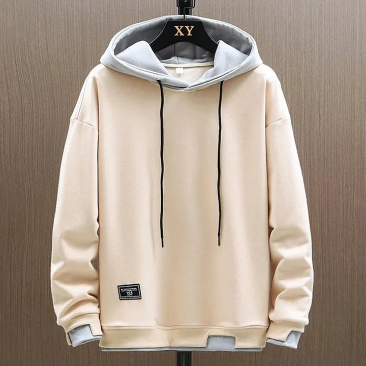 Stylish mens hoodie in a two-tone design with a bold contrast hood, perfect for fall fashion.