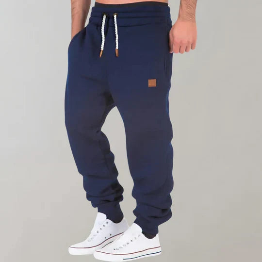 Stylish men's jogging pants, a go-to for everyday fashion. Offers a sporty look with ultimate comfort and a relaxed fit.