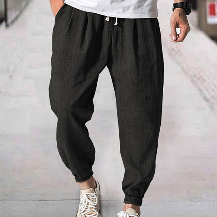 Athletic men's jogging pants, ideal for gym, running, or comfortable everyday casual and loungewear.