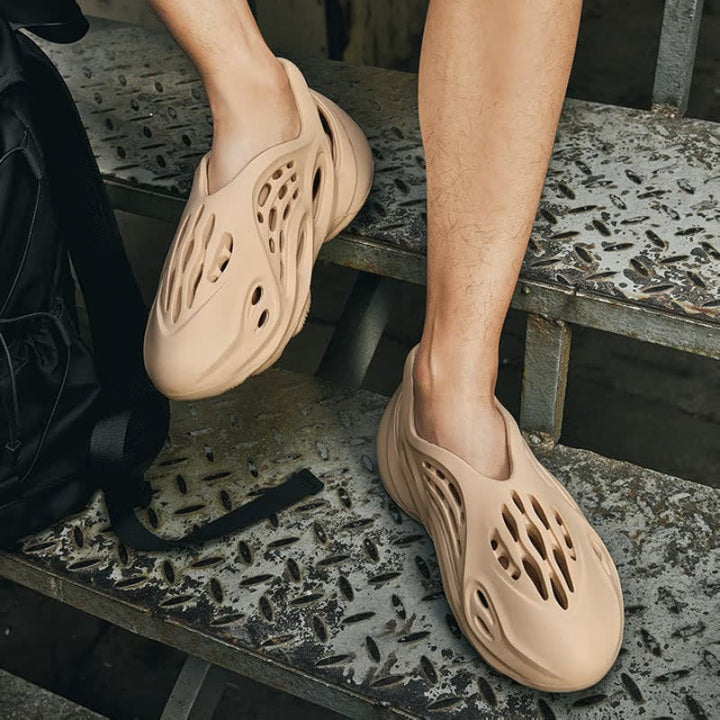 Lightweight men's summer casual shoes with breathable mesh, designed for easy slip-on comfort and everyday versatility.