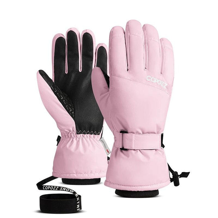 Man wearing ultralight waterproof gloves during a snowy outdoor adventure