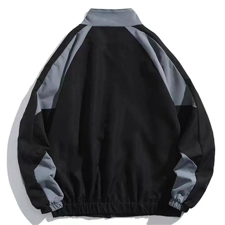 Casual men's color-block windbreaker, urban fashion for spring/fall. Lightweight outerwear for everyday style.