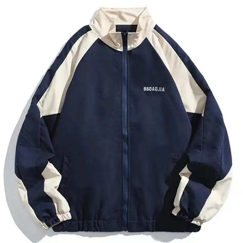 Lightweight men's windbreaker jacket with modern color-block design. Urban style for effective weather protection.