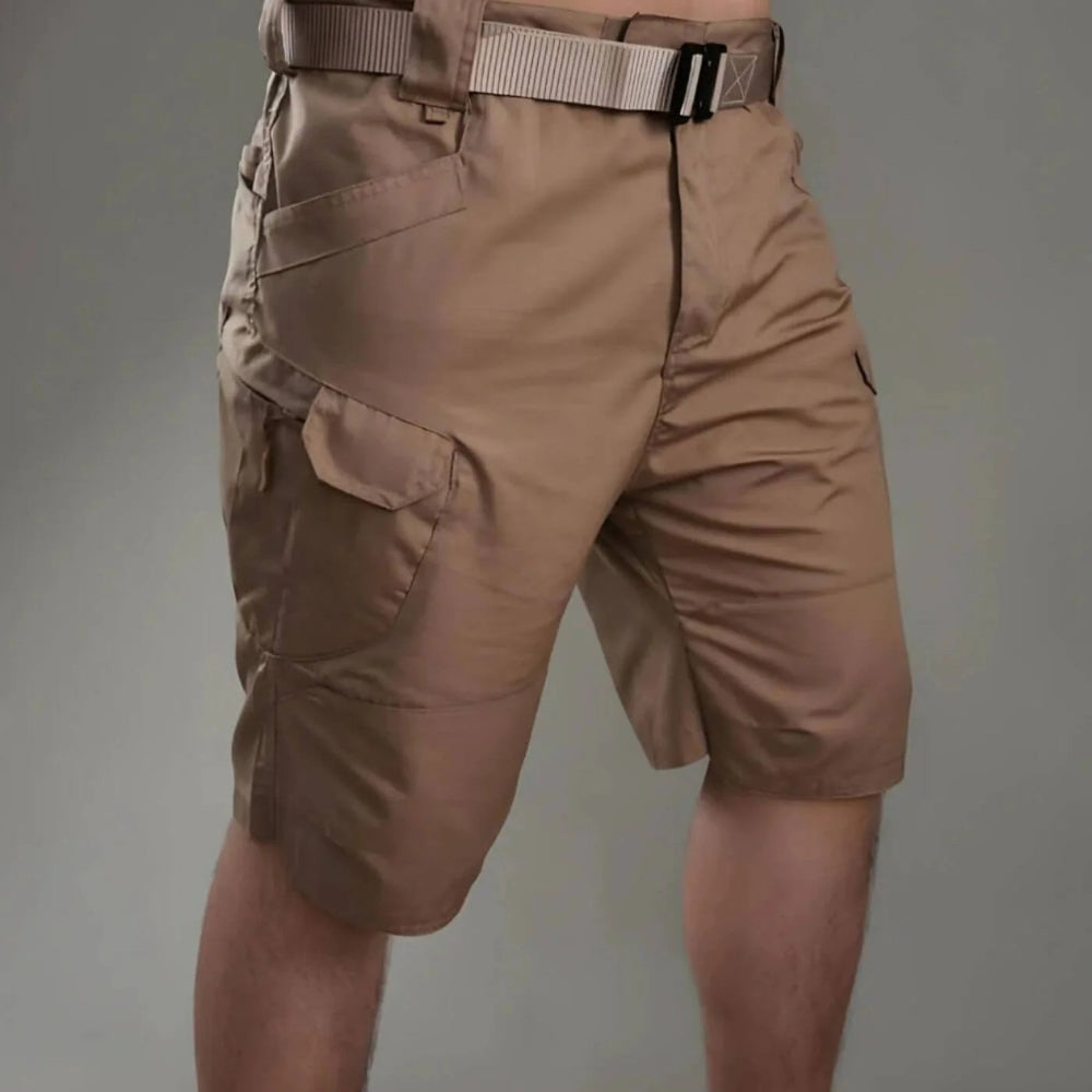 Men's utility cargo shorts in a durable fabric, perfect for outdoor adventure & travel.