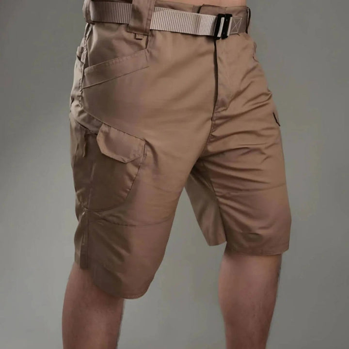 Men's utility cargo shorts in a durable fabric, perfect for outdoor adventure & travel.