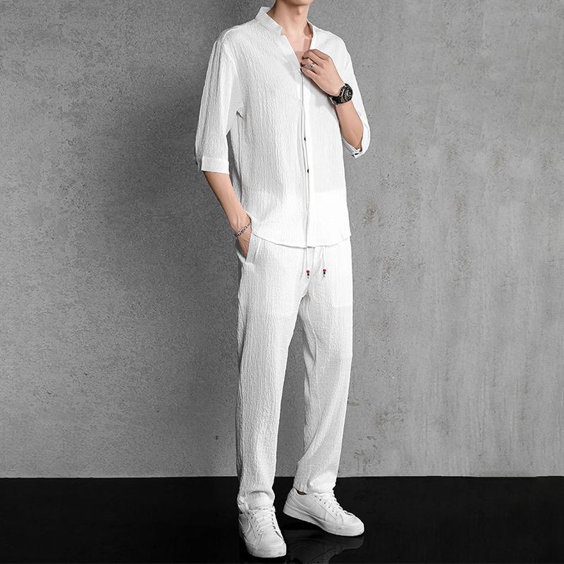 Men's V-neck linen two-piece outfit set with relaxed fit drawstring pants, perfect for summer casual wear.