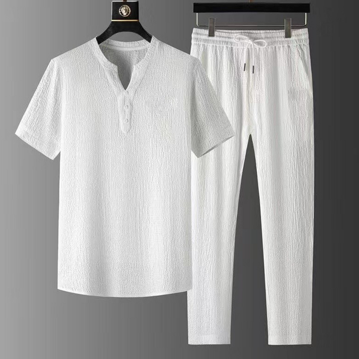 Complete men's V-neck linen two-piece outfit set, including shirt & drawstring pants for ultimate summer comfort.