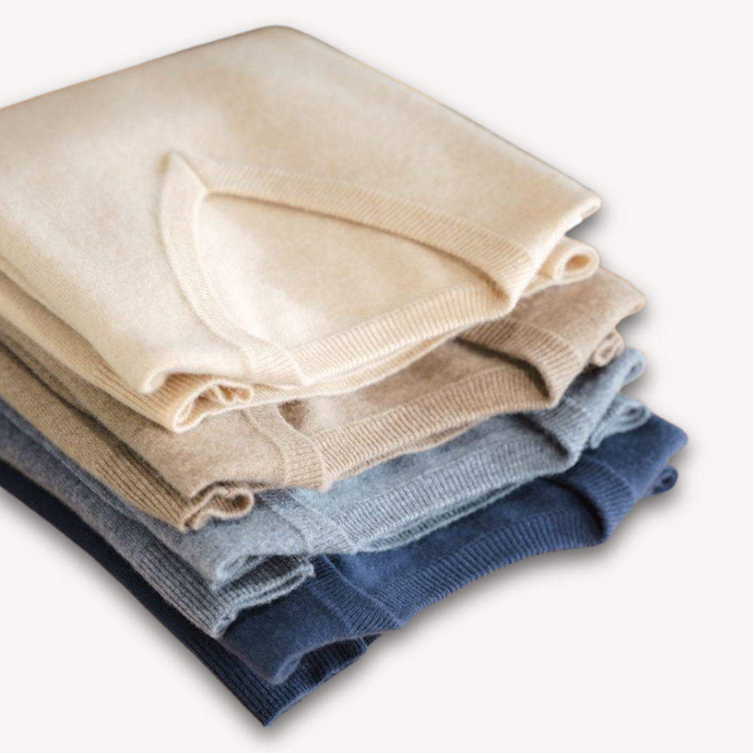 Detail of the V-neck sweater collar, slim fit, showcasing soft fabric and elegant design.
