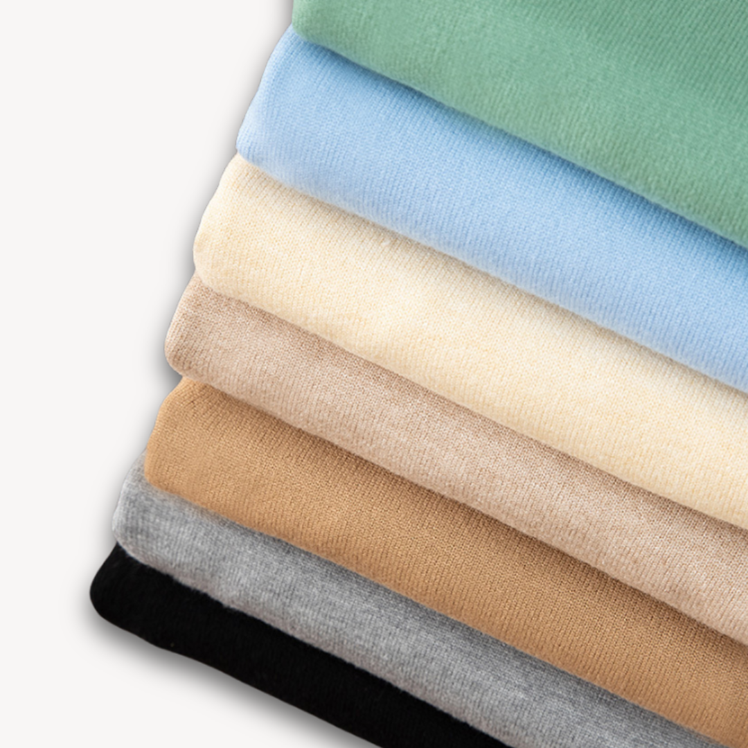 Men's V-neck sweater, slim fit, soft comfort, laid flat, ready for versatile styling.