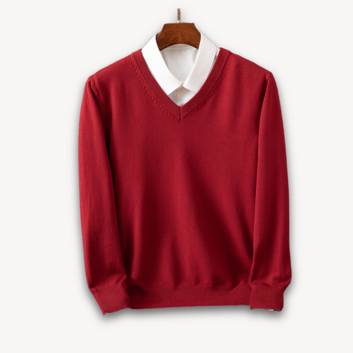 Close-up of men's V-neck sweater texture, slim fit, showcasing soft comfort & quality.