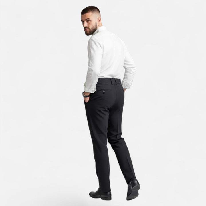 Valmonti tailored fit suit trousers for men, featuring a stylish Paris buckle.
