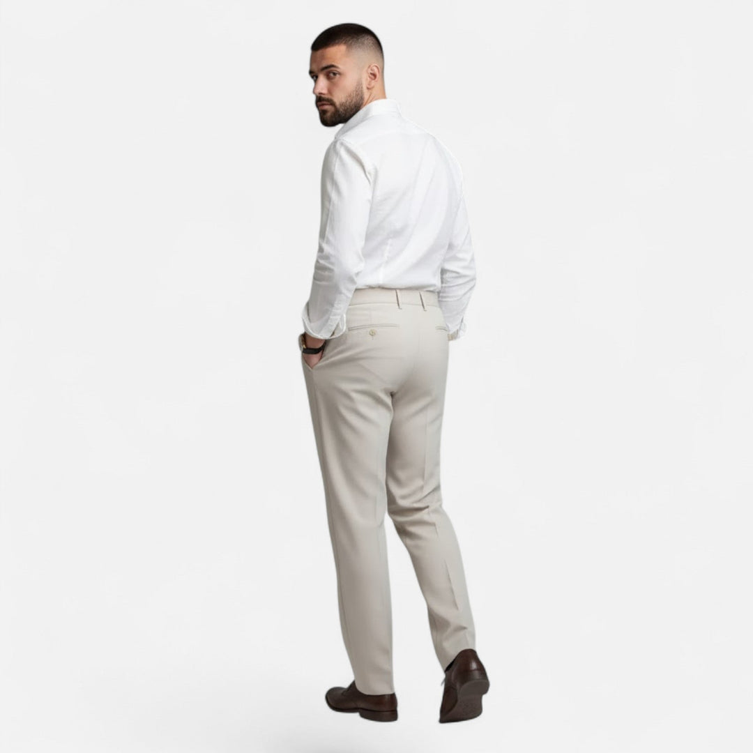 Experience tailored elegance with these men's straight-leg suit trousers from Valmonti.