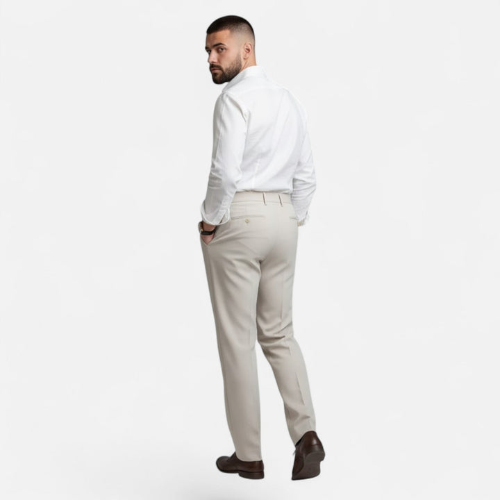 Experience tailored elegance with these men's straight-leg suit trousers from Valmonti.