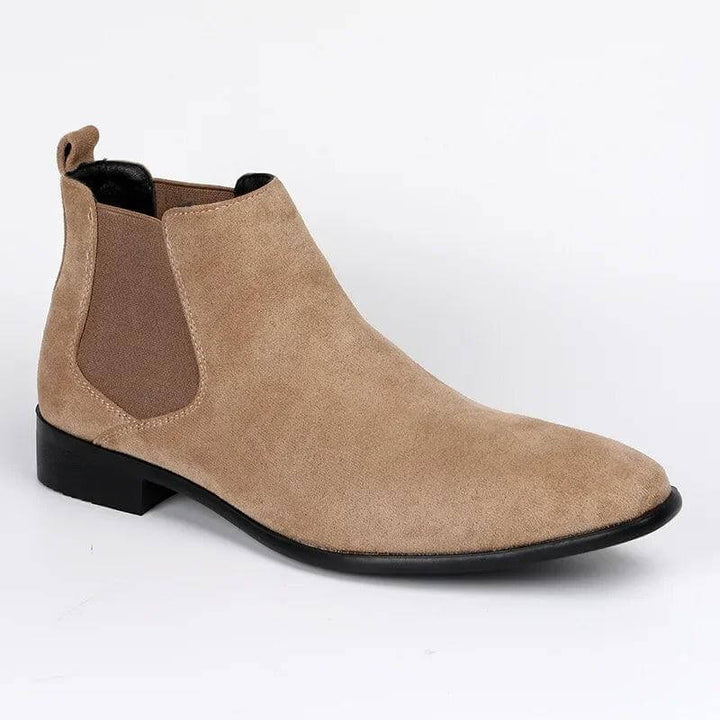 Classic men's black Chelsea ankle boots. Durable and sophisticated slip-on footwear for fashion-forward men.