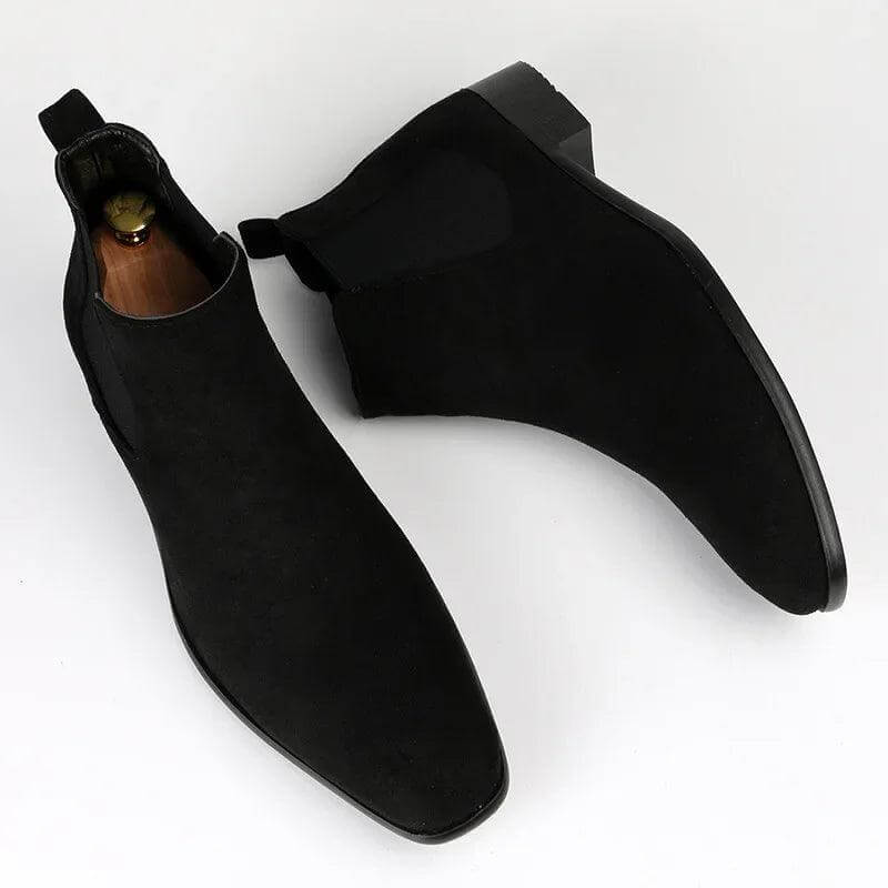 High-quality brown men's Chelsea boots, built for durability and versatile fashion. Essential slip-on footwear.