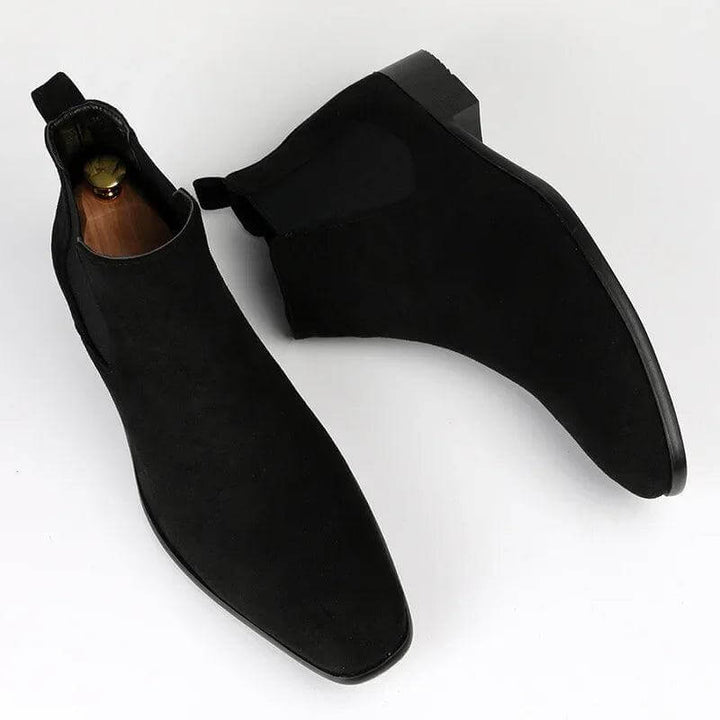 High-quality brown men's Chelsea boots, built for durability and versatile fashion. Essential slip-on footwear.