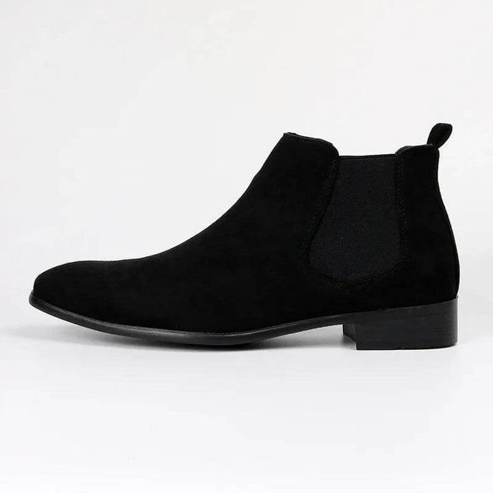 Comfortable beige Chelsea boots for men. Slip-on design and durable construction for everyday style.