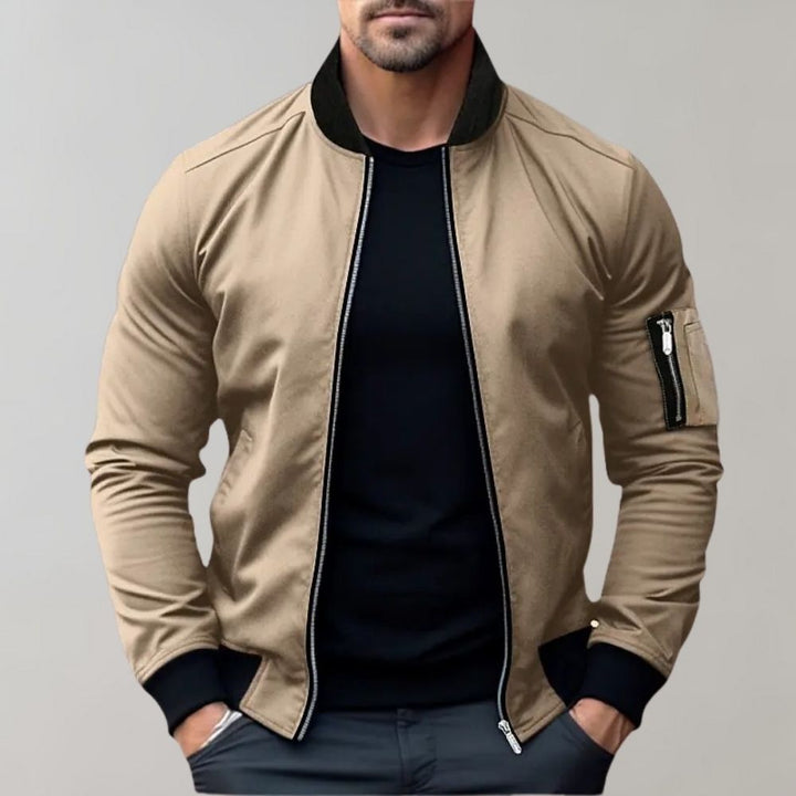 Stylish men's bomber jacket with ribbed cuffs and long sleeves, ideal for spring outerwear.
