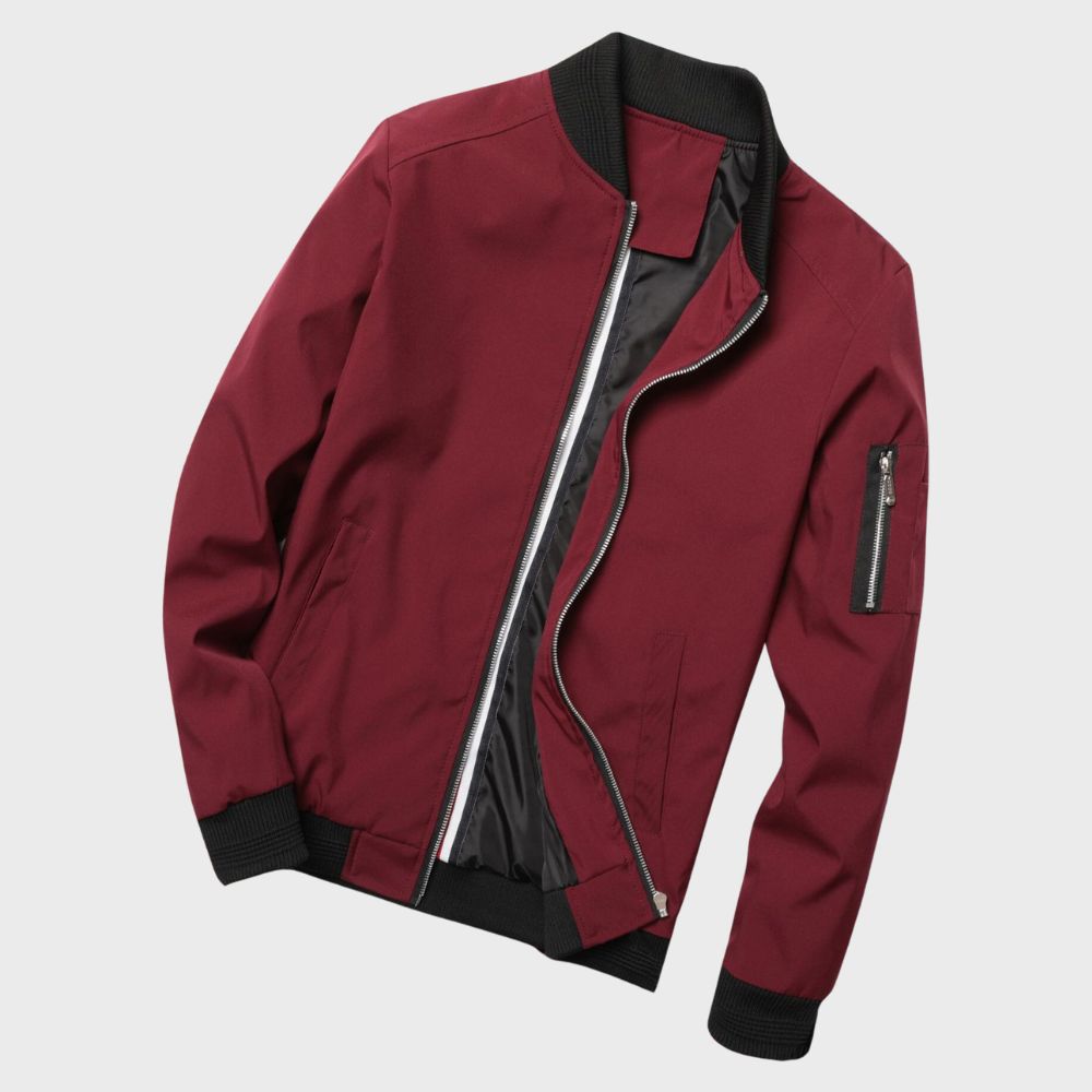 Stylish grey men's bomber jacket with full zip and ribbed cuffs, ideal for fall/spring fashion.