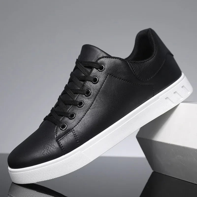 Sleek black men's lace-up shoes for casual or polished everyday wear, offering comfort & modern versatile style.