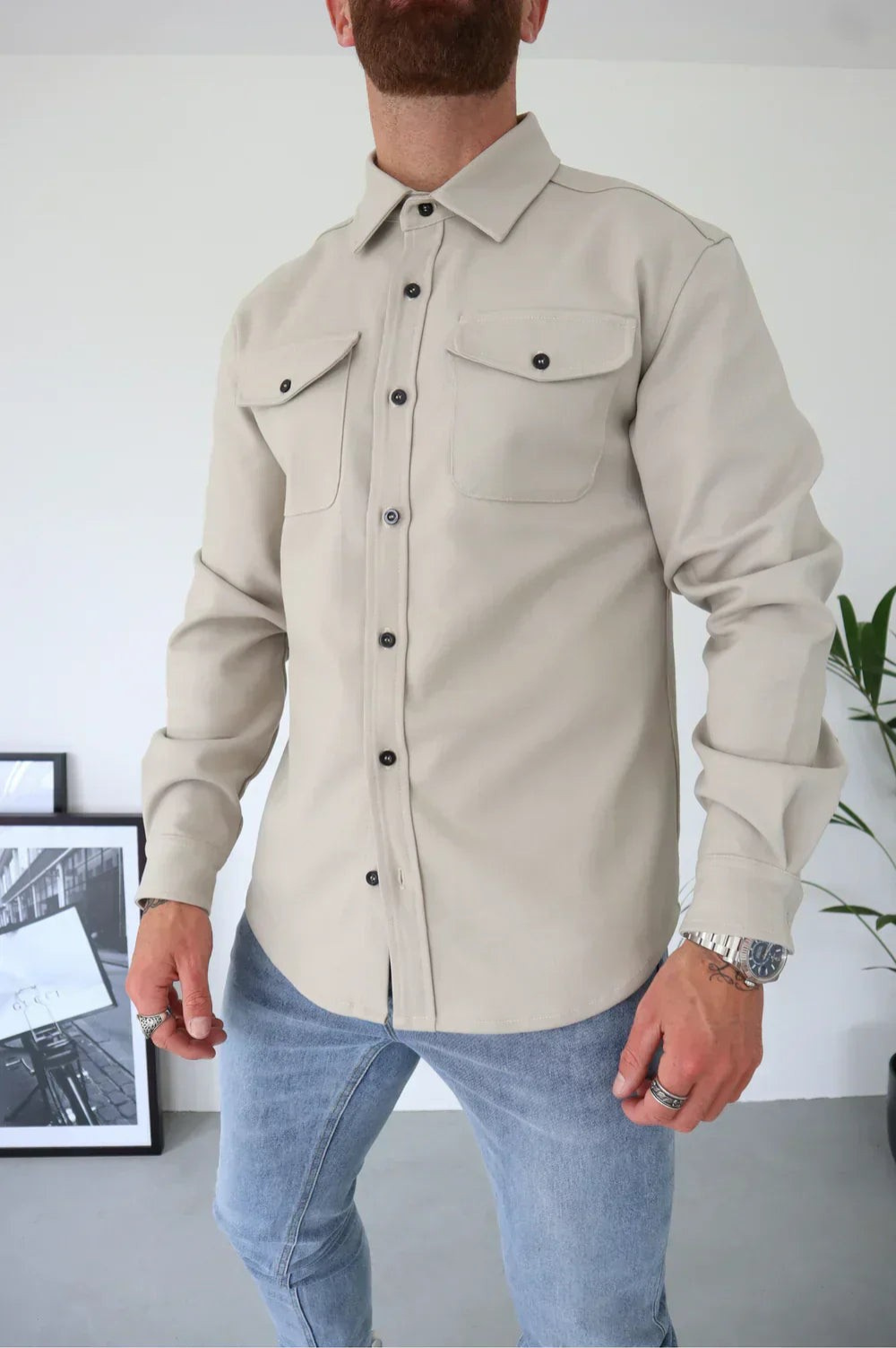 Stylish men's outerwear: a versatile button-up shirt jacket for all seasons.