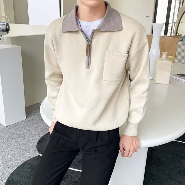 Comfort fit men's half-zip sweater with a polo collar, a versatile layering top for stylish casual outfits.