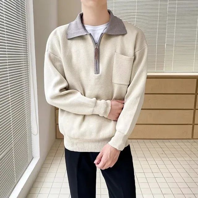 Menswear half-zip polo sweater. Stylish, versatile casual knit for a smart casual look and comfortable layering.