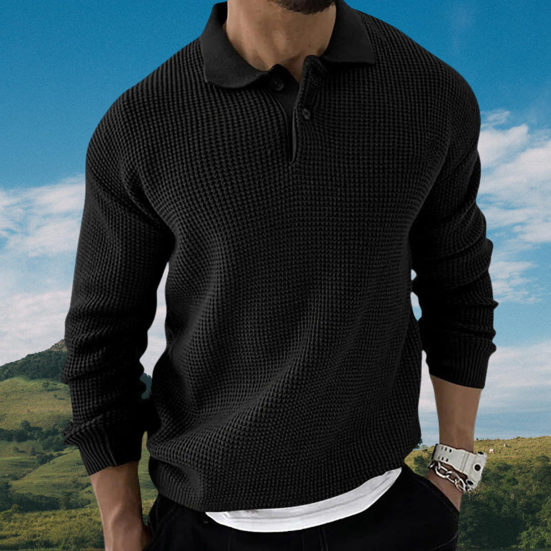 Close-up of the detailed knit texture on a men's comfortable long sleeve sweater.