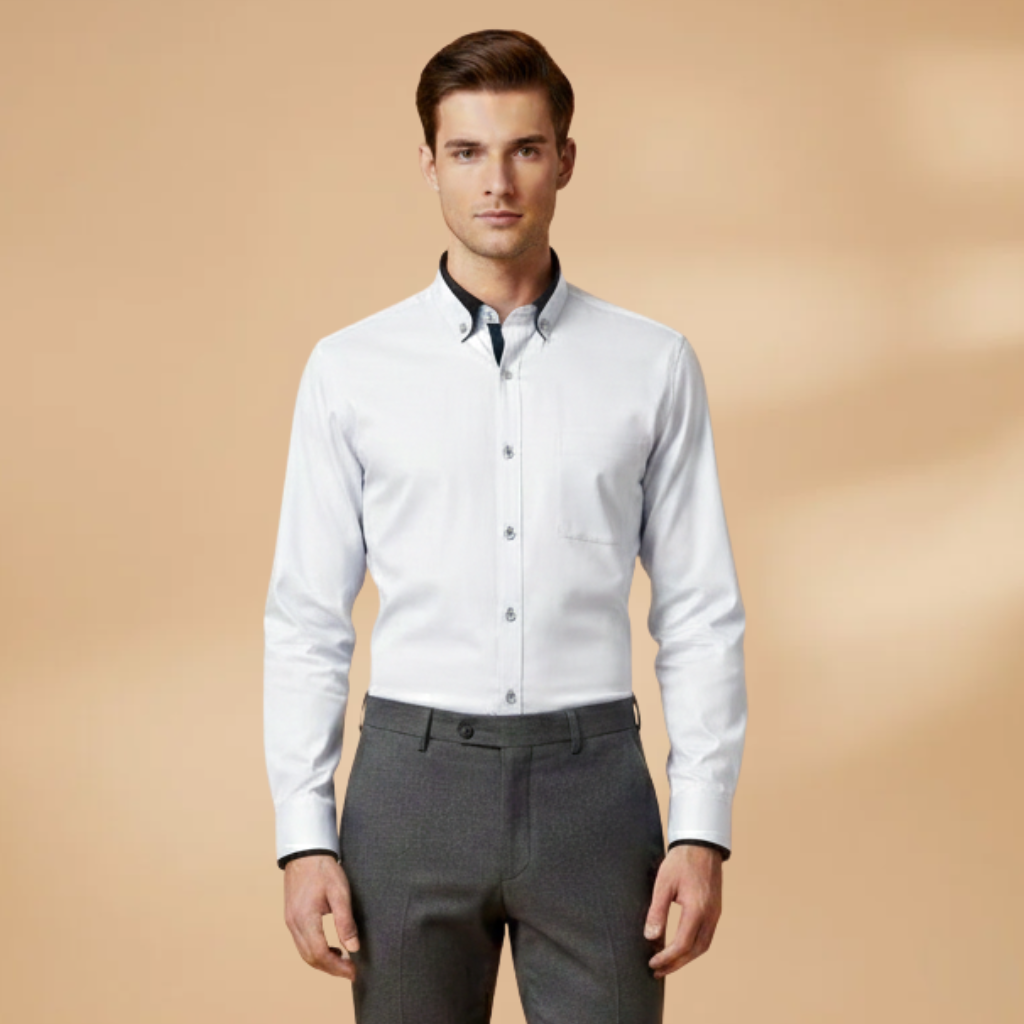 Man wearing a versatile long sleeve button-down shirt. Smart casual, collared, adjustable cuffs, perfect for daily wear.