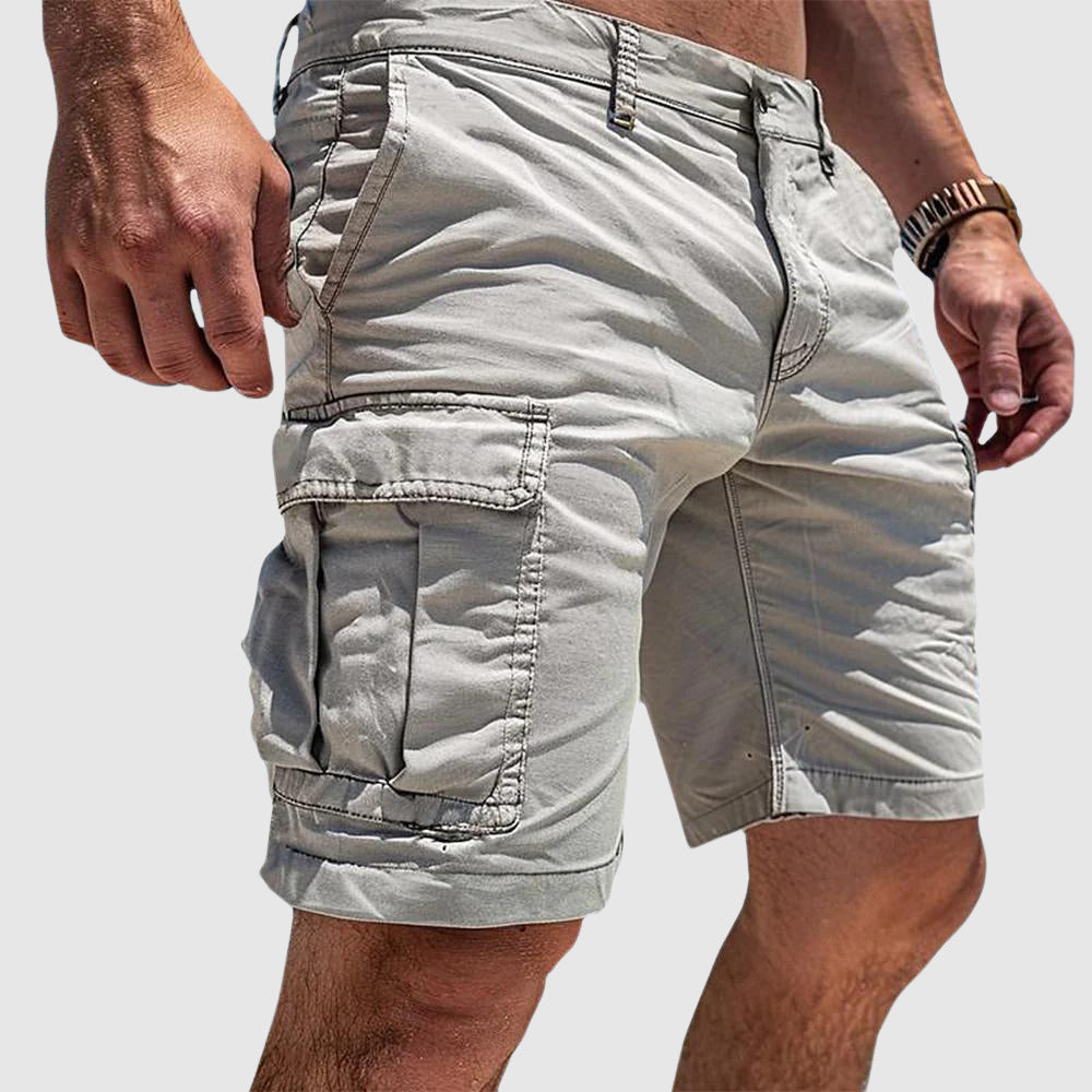 Durable men's cargo shorts for outdoor adventures, featuring deep utility pockets and comfortable fit.