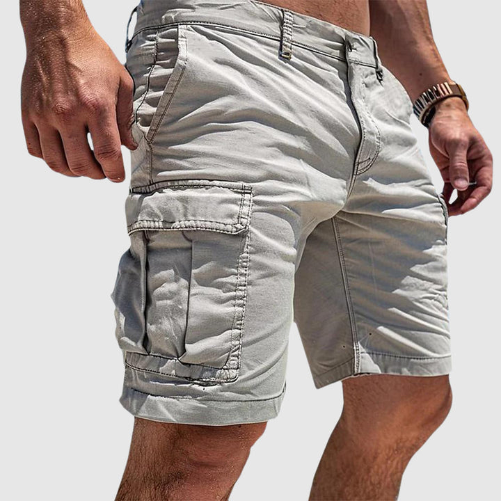 Durable men's cargo shorts for outdoor adventures, featuring deep utility pockets and comfortable fit.