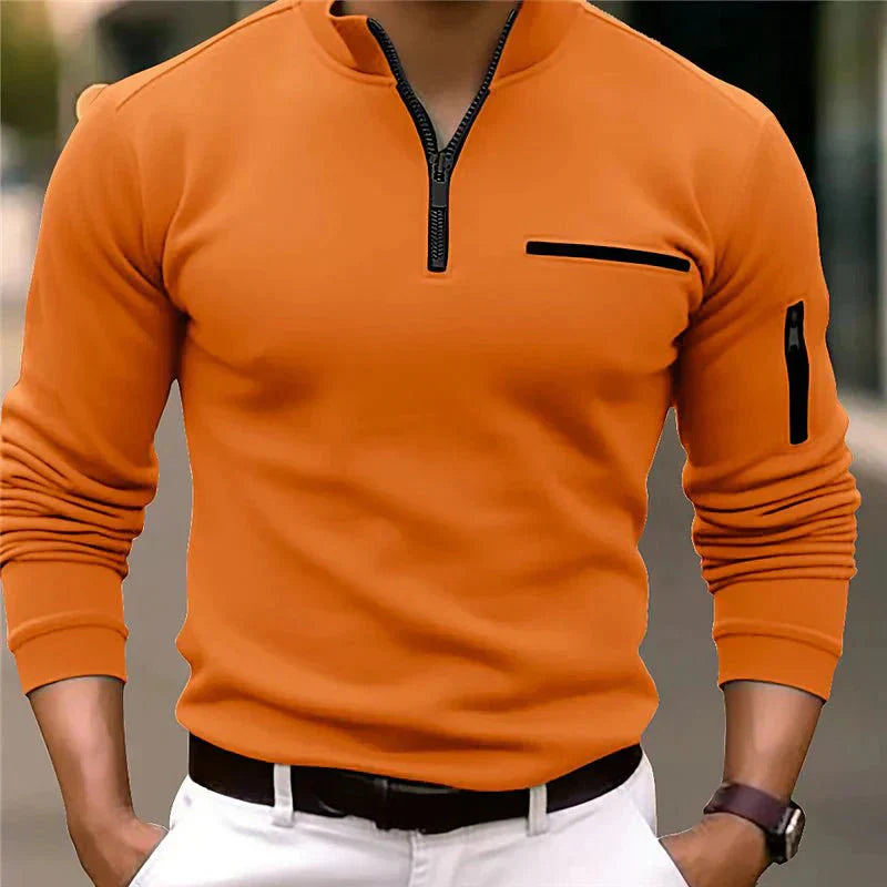 New men's quarter zip sweater, long sleeve and comfortable, featuring a prominent chest pocket. Great for casual.