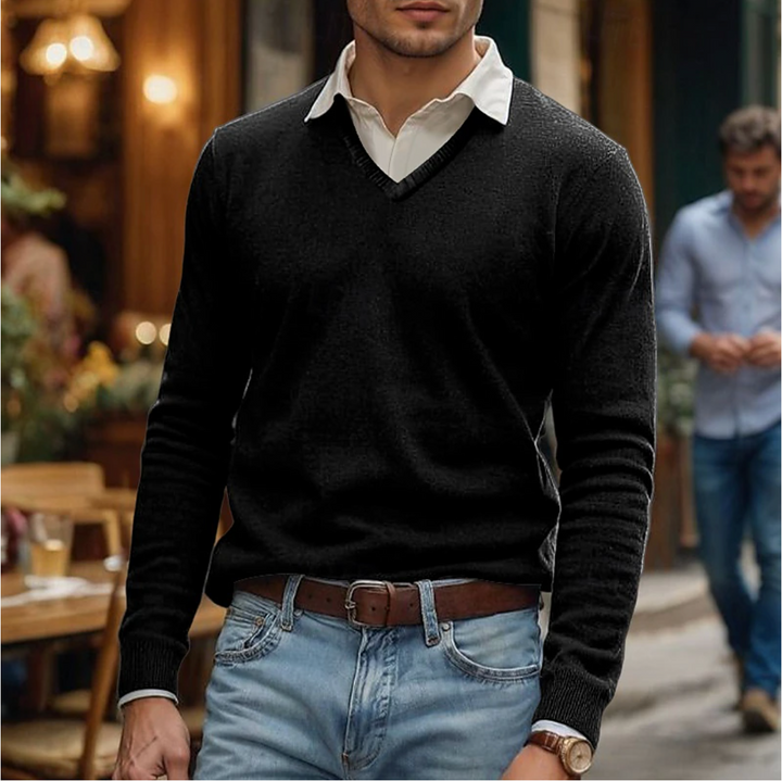 Close-up of a men's comfortable V-neck knit sweater, highlighting the quality fabric and cozy texture.