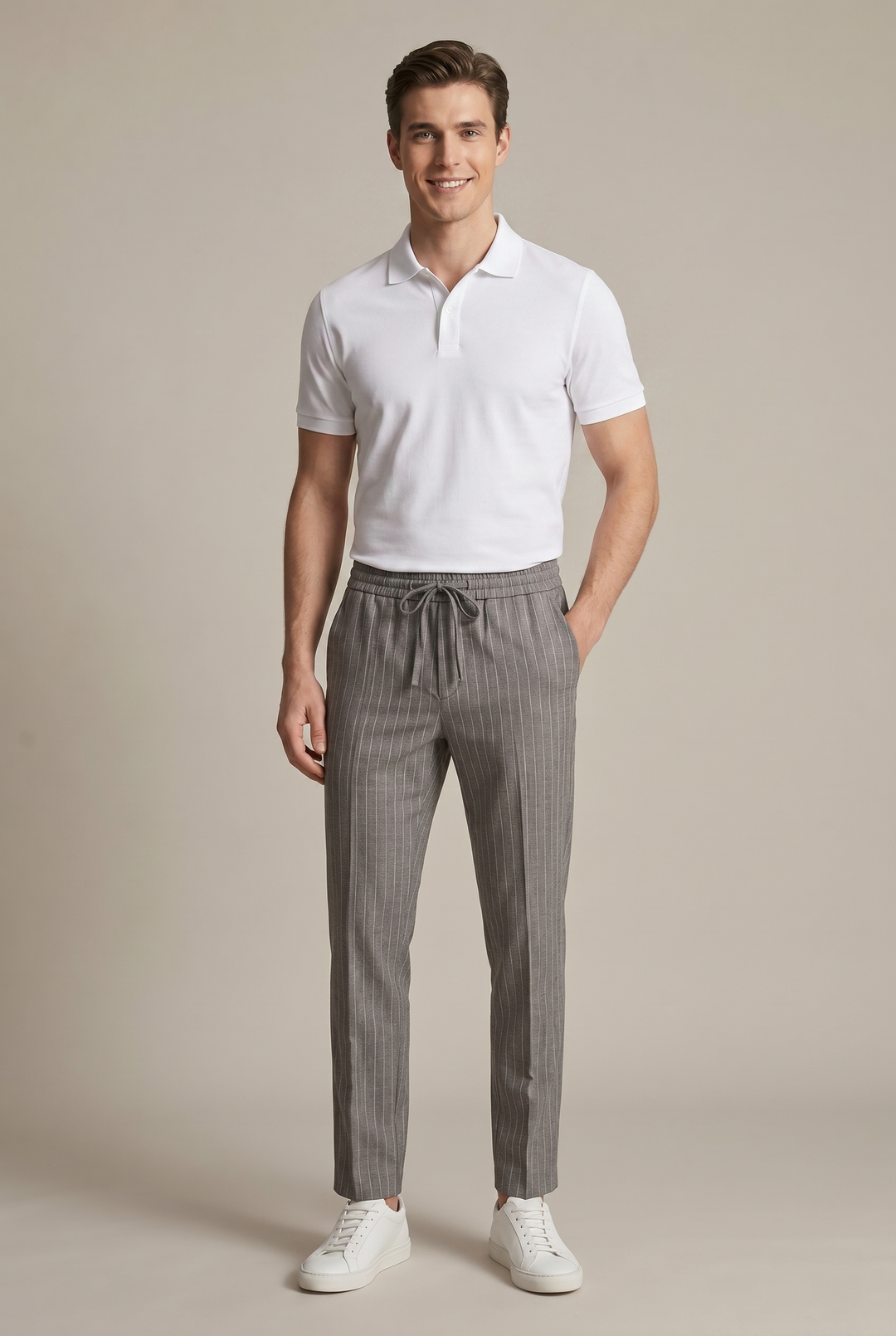 Stylish men's pinstripe trousers, ideal for spring/summer, offering a tapered fit for casual to formal wear.