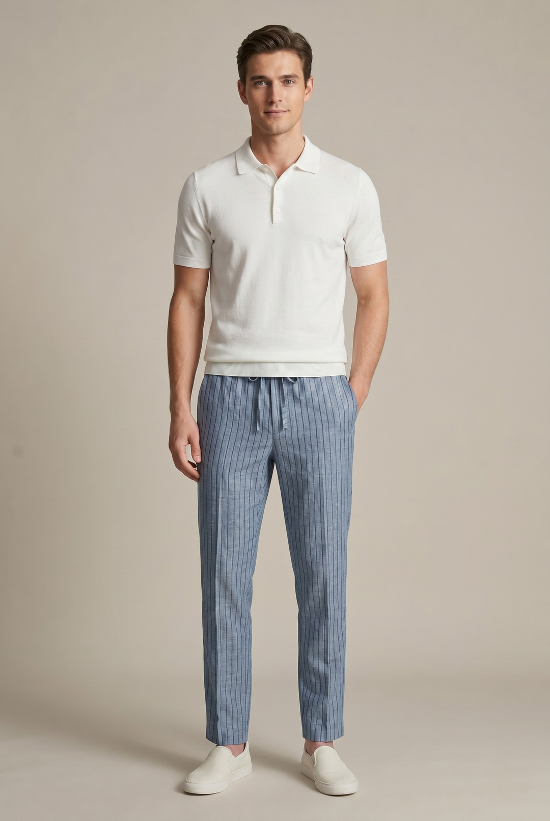 Men's contemporary tapered trousers with vertical pinstripes and an elastic waistband for comfort.