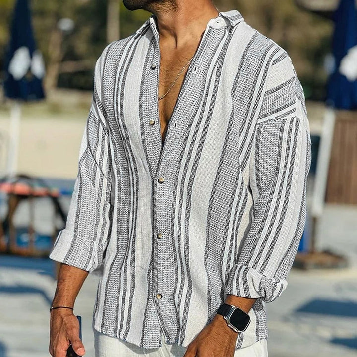 Close-up of men's vintage striped casual shirt fabric and collar detail