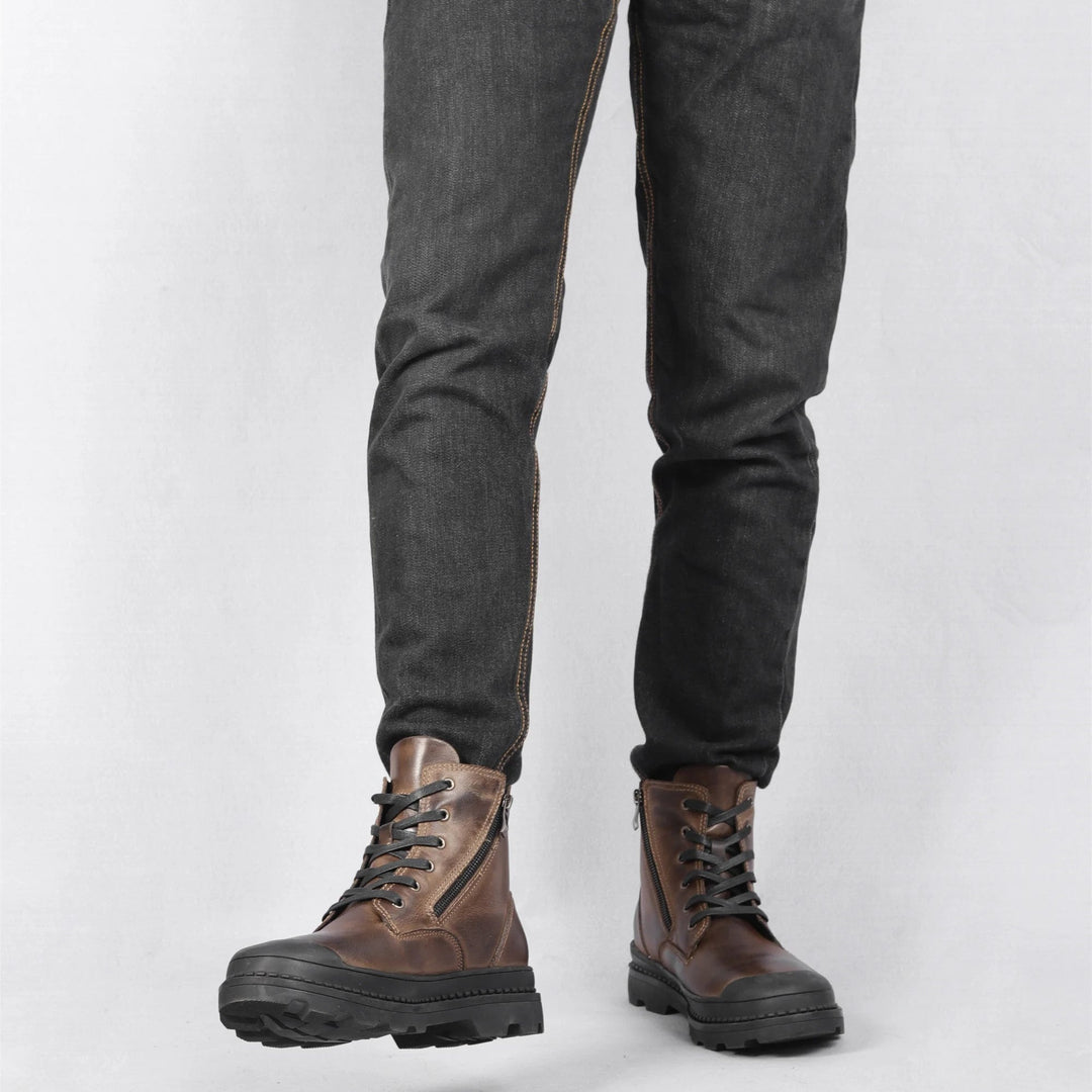 Explore in comfort with men's durable vintage leather combat boots, lace-up and zip closure.
