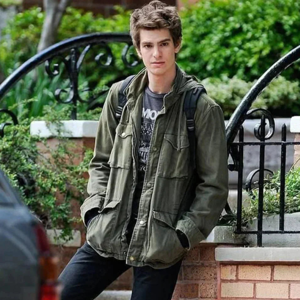 Green men's vintage field jacket. Classic design, adjustable waist for outdoor adventures and fashion.