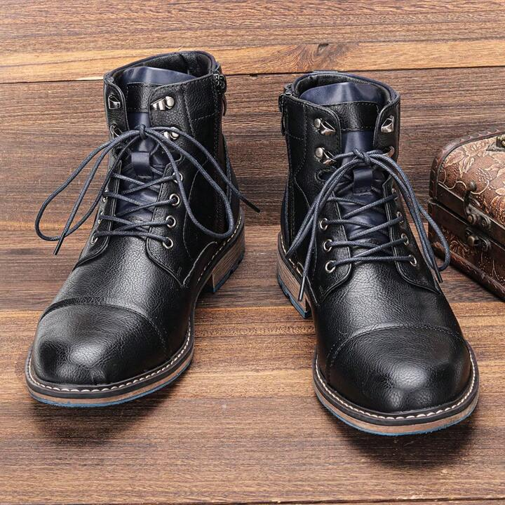 Model showcasing men's vintage-style leather ankle boots