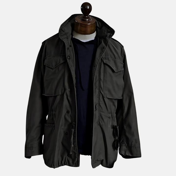 Men's vintage military field jacket in rugged olive green. Durable all-season outerwear for casual utility style.