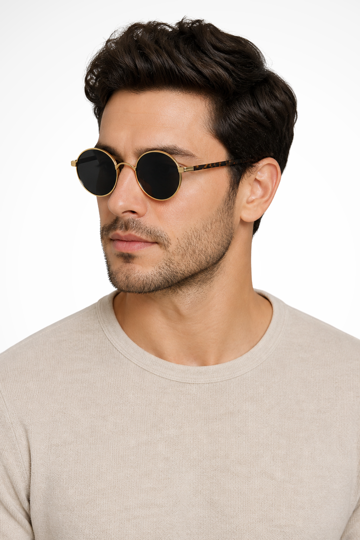 Men's vintage round sunglasses with gold frames & gray lenses, offering classic retro style & UV400 protection.