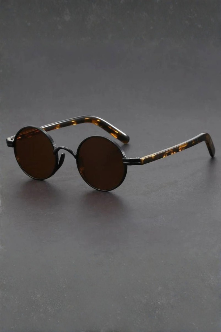 Retro men's round sunglasses featuring sleek black frames & dark gray lenses, ensuring UV400 eye protection.