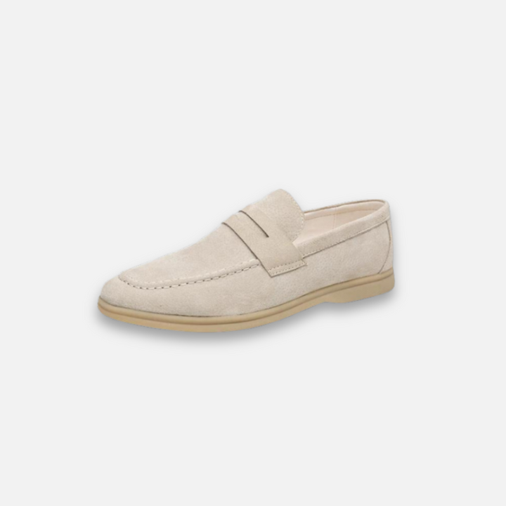 Close-up of men's vintage loafers showing detailed stitching and comfortable slip-on design.