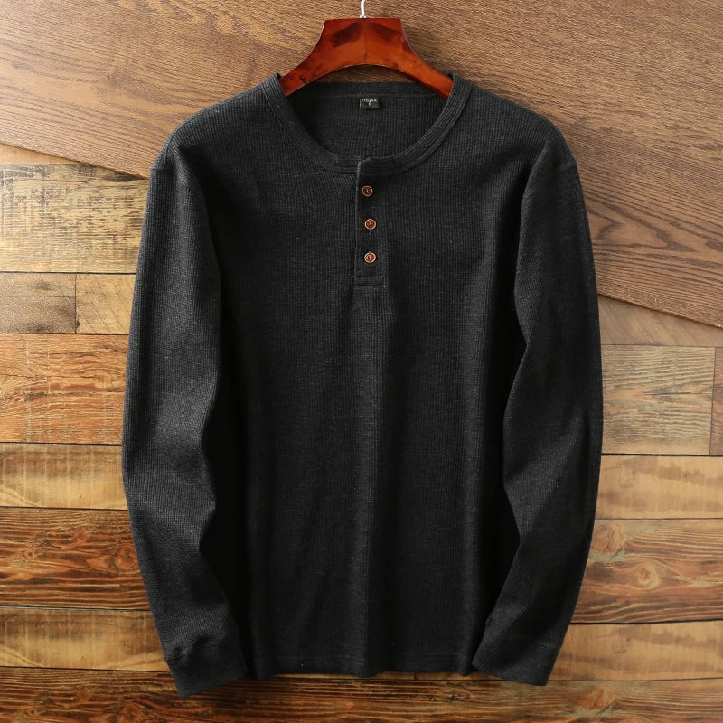 Side profile of men's heather grey henley shirt, textured long sleeve top