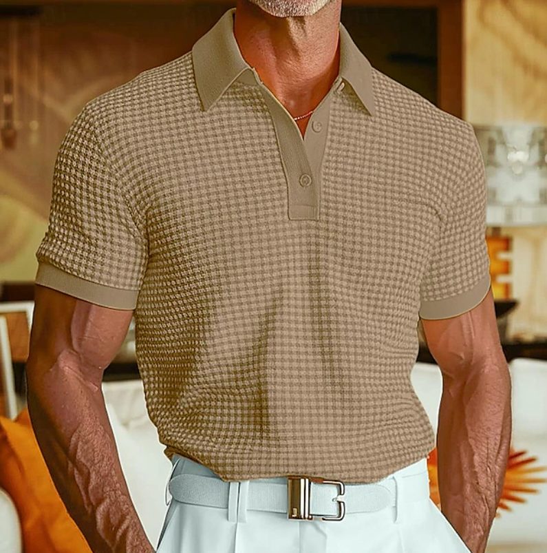 Close-up of a men's smart casual waffle polo shirt, featuring a unique textured collar and button placket.