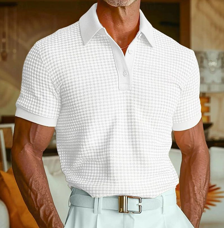 Comfortable men's short-sleeve waffle polo shirt, versatile for smart casual wear, with a stylish textured collar.