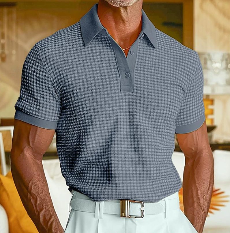 Detailed view of the textured collar on a men's waffle knit polo, showcasing its unique design for smart casual style.